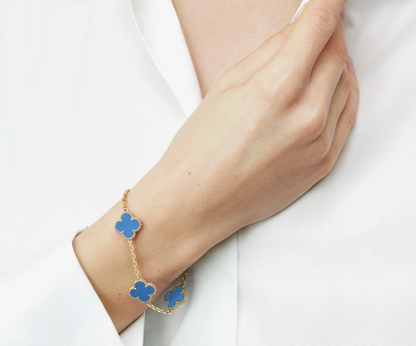 Vintage Alhambra bracelet, 5 motifs, 18K yellow gold, blue agate.